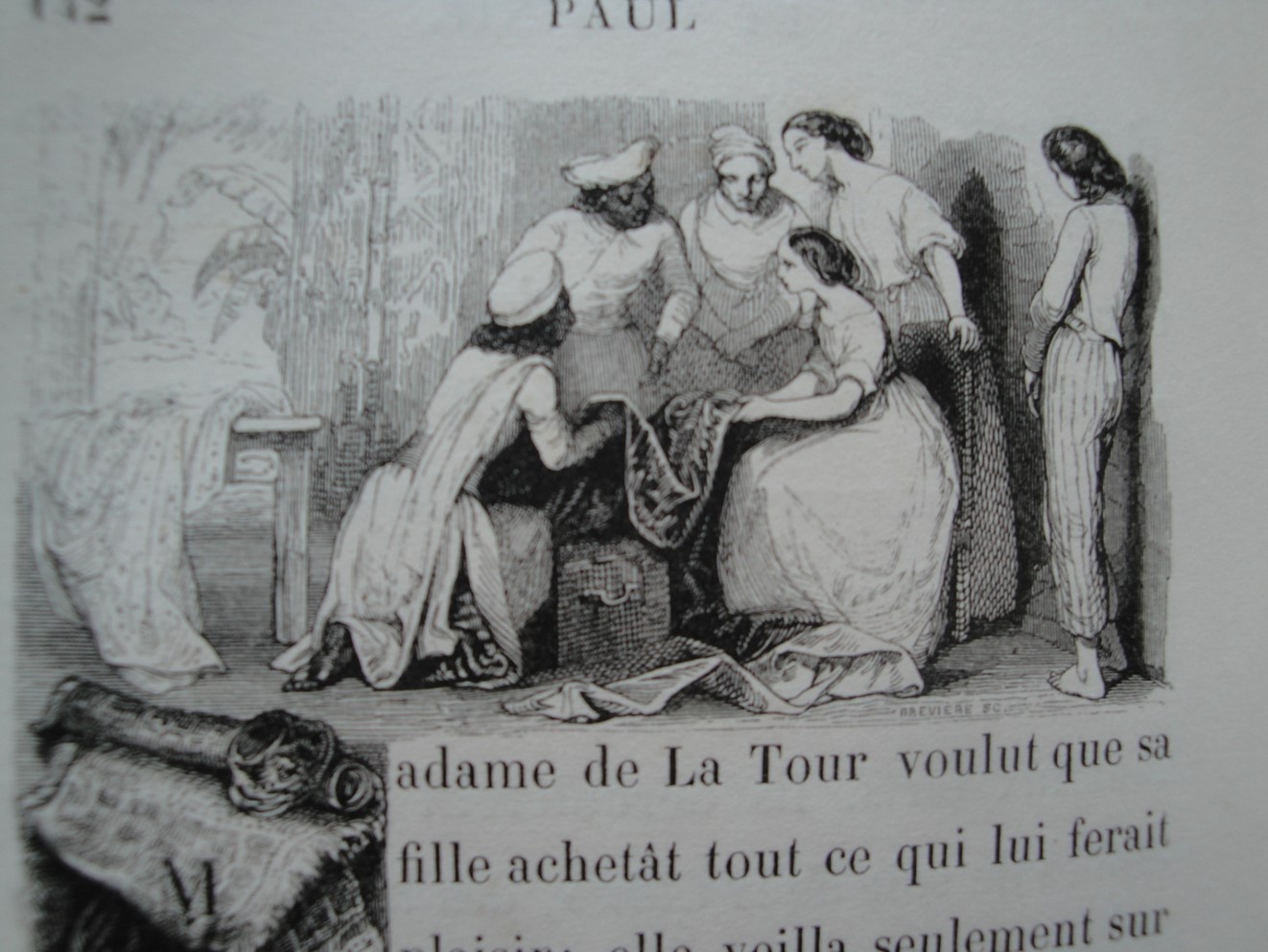 Dans cette illustration, Madame de la Tour achète des étoffes pour sa fille Virginie pendant que Paul, en retrait, contemple la scène. Léon Curmer, 1838. Figure 13.
